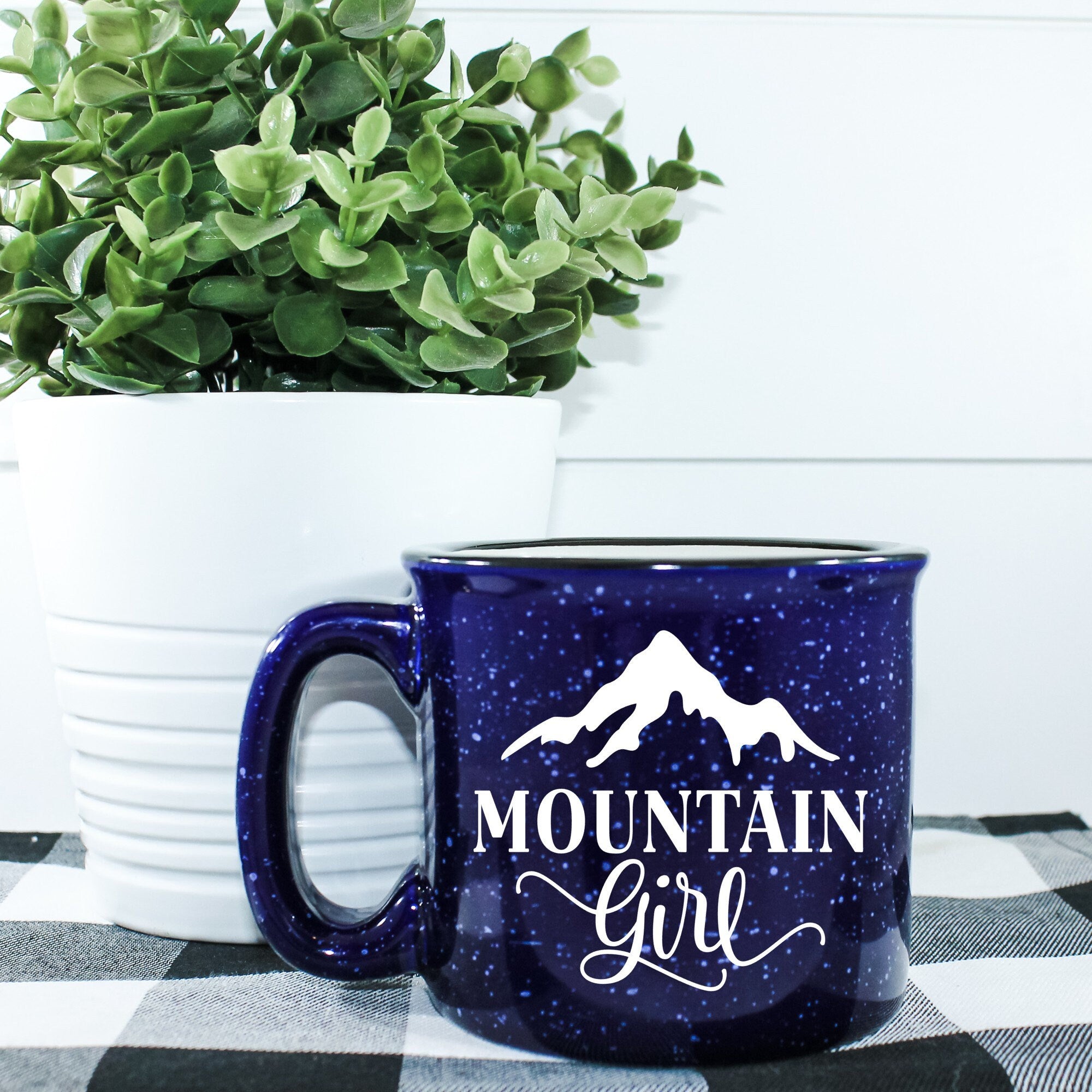 Mountain Girl Campfire Mug, a ceramic mug with a unique design, perfect for outdoor use and stylish enough for home.