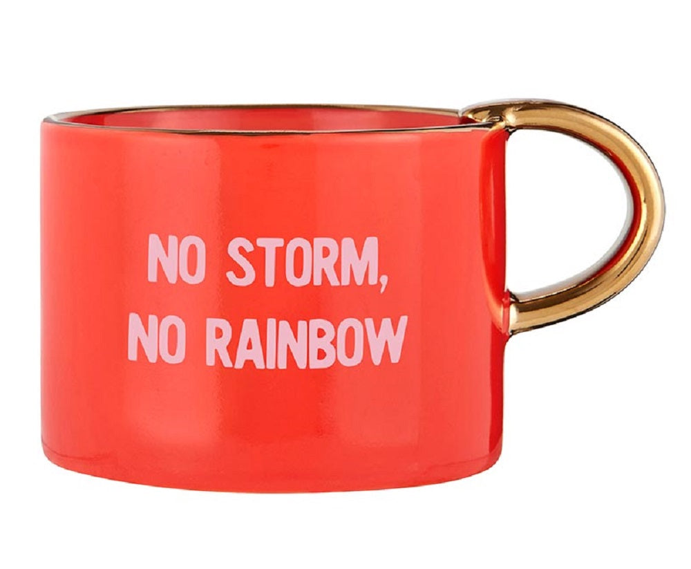 No Storm, No Rainbow Mug, Tray, and Spoon Set featuring a red ceramic mug with pink lettering, a rainbow motif tray, and a gold spoon.