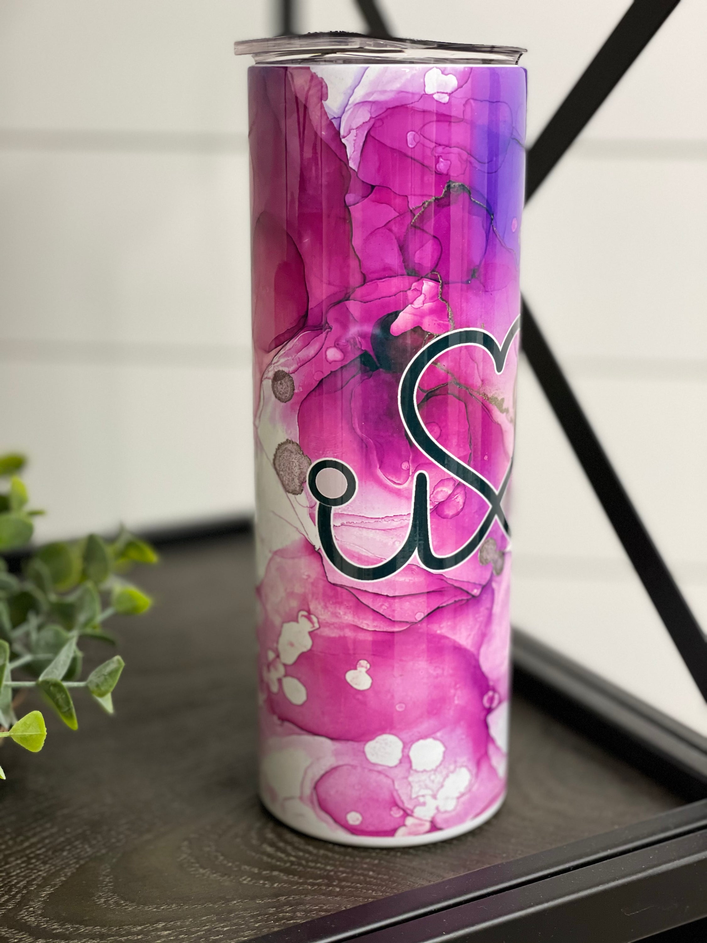 Nurse Beat 20oz Skinny Tumbler with a vibrant design, featuring a reusable straw, showcasing its durable full wrap construction.