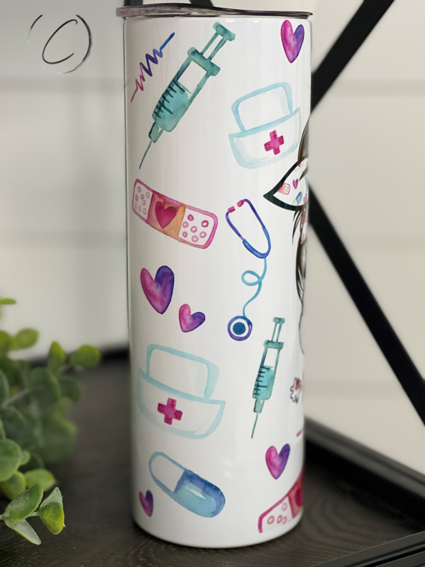 A stylish #Nurselife 20oz skinny tumbler featuring a vibrant full wrap design, perfect for nurses and healthcare professionals.