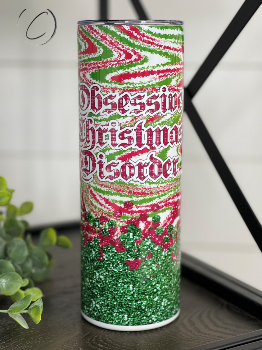 Obsessive Christmas Disorder 20oz Skinny Tumbler with festive design and reusable straw.