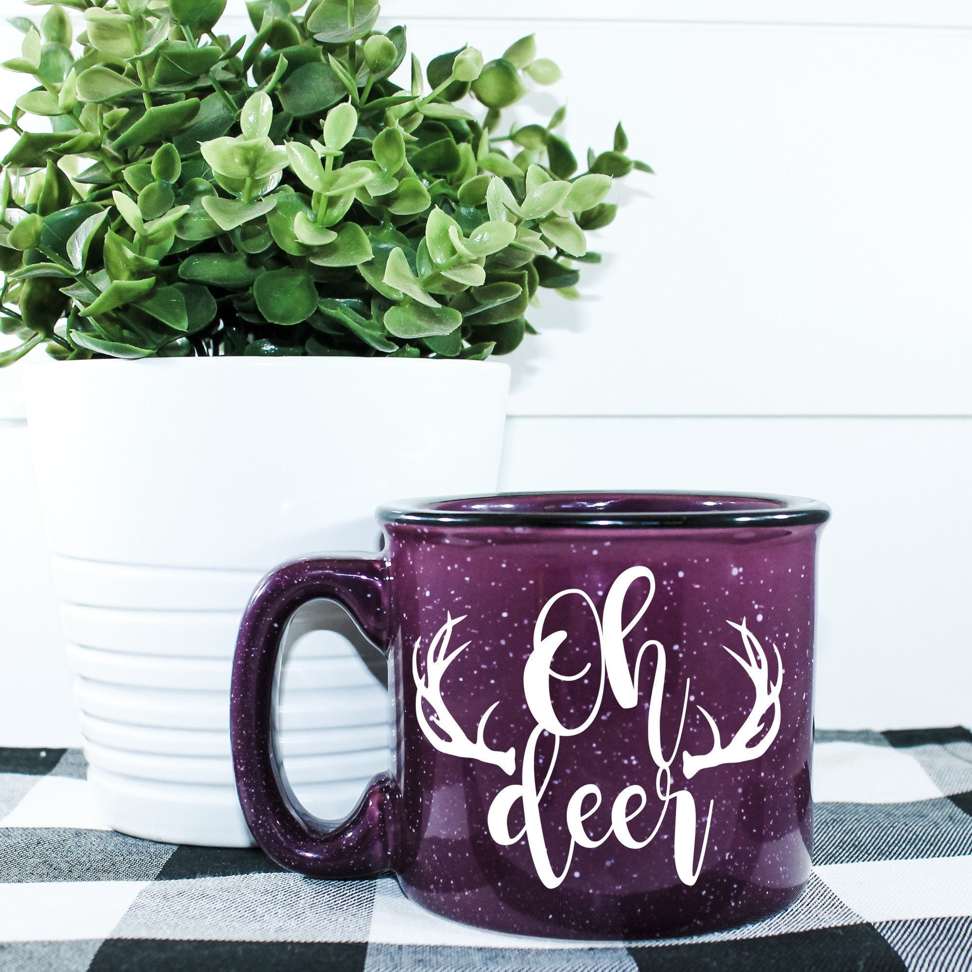 Oh Deer Campfire Mug featuring a deer design, ceramic material, and a 4-inch diameter, perfect for outdoor use.