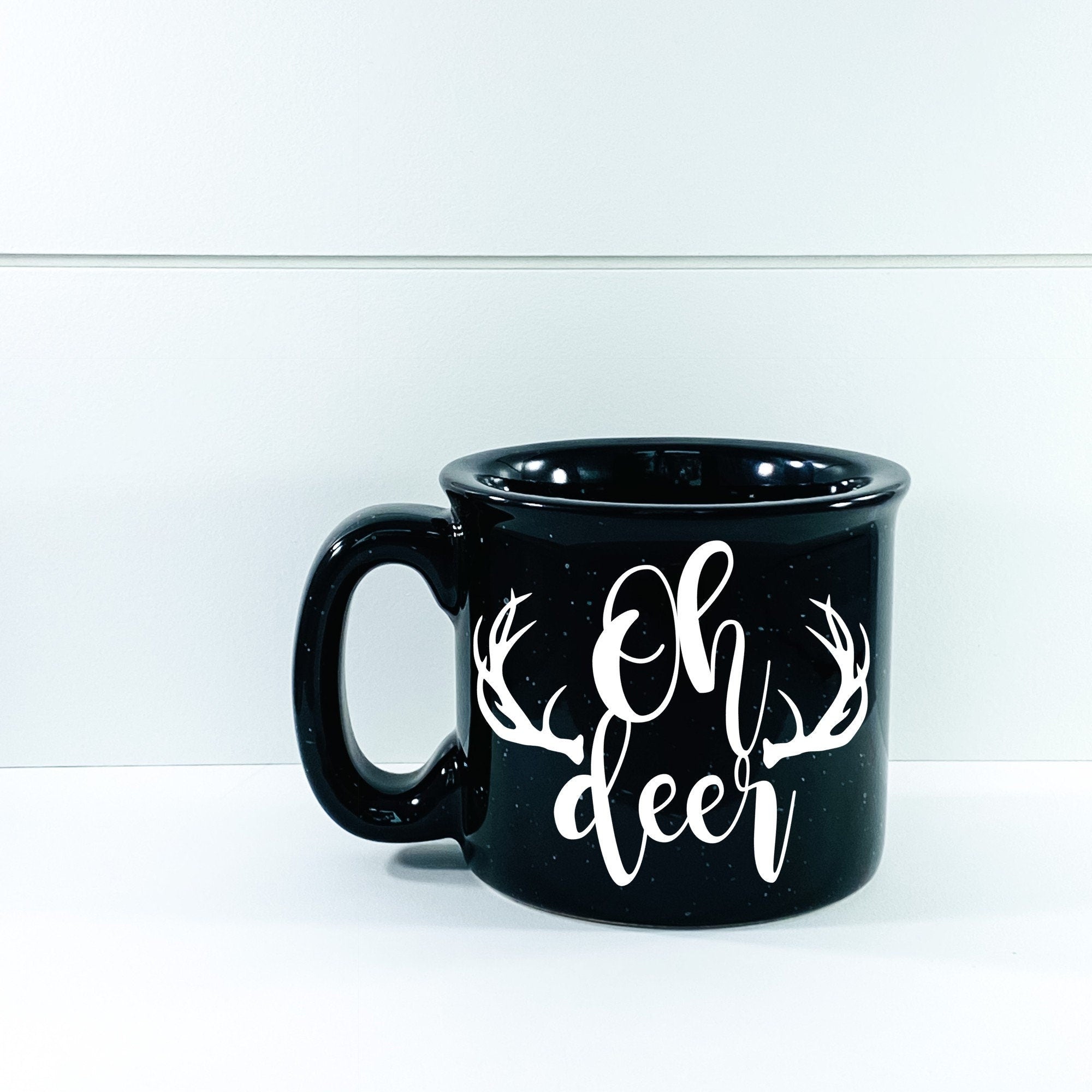 Oh Deer Campfire Mug featuring a deer design, ceramic material, and a 4-inch diameter, perfect for outdoor use.