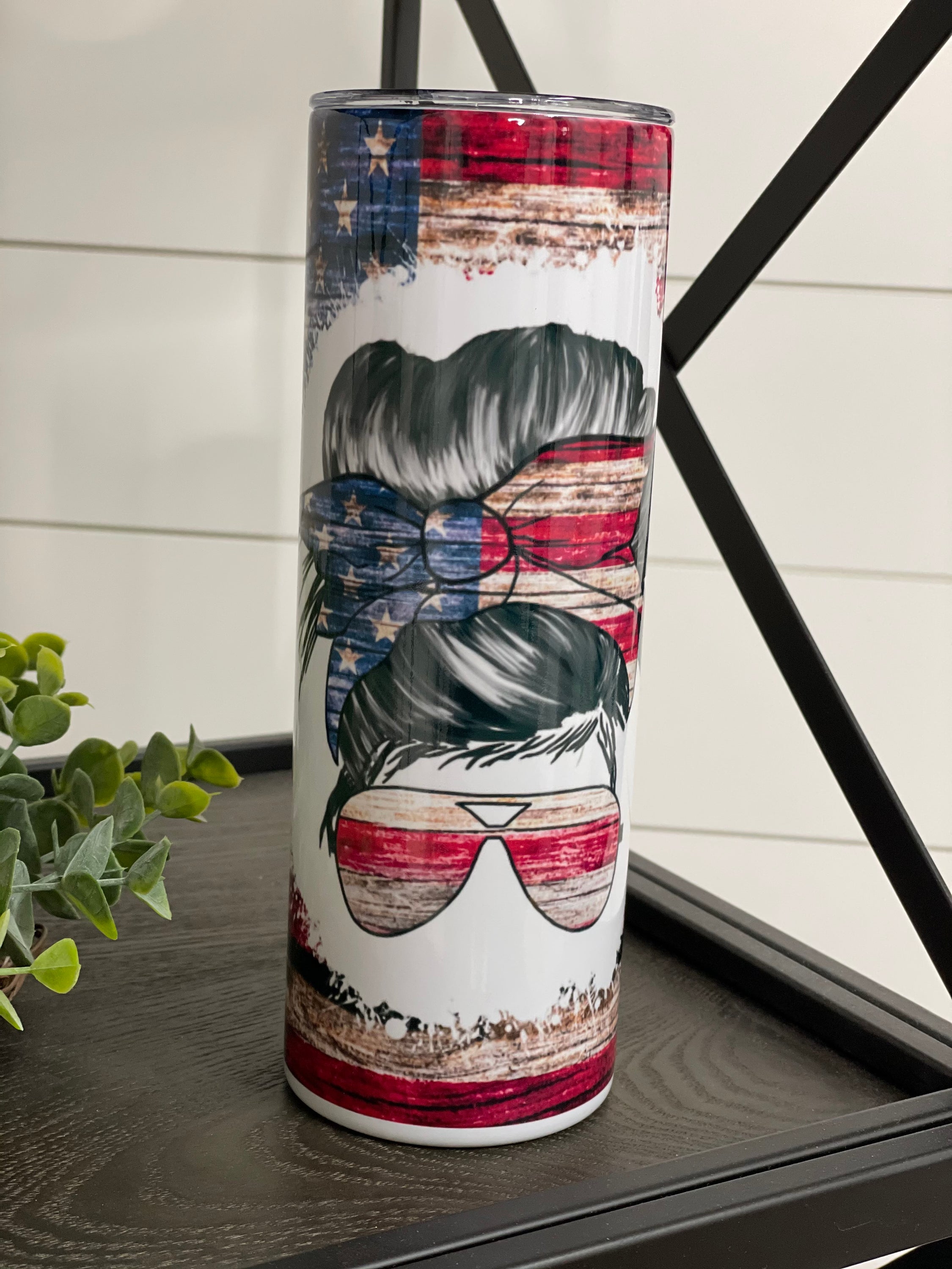 Patriotic Messy Bun 20oz Skinny Tumbler with vibrant design and reusable straw.