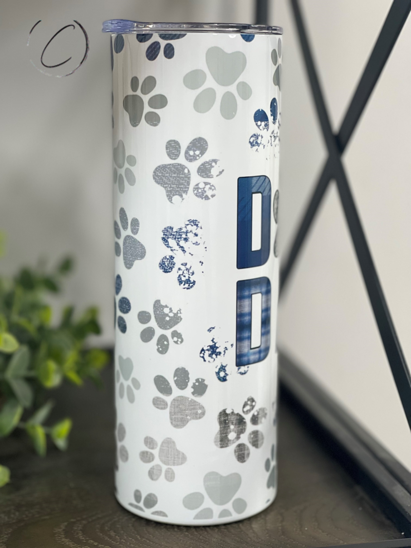 Paw Print Dog Dad 20oz Skinny Tumbler featuring a vibrant paw print design, perfect for dog lovers.