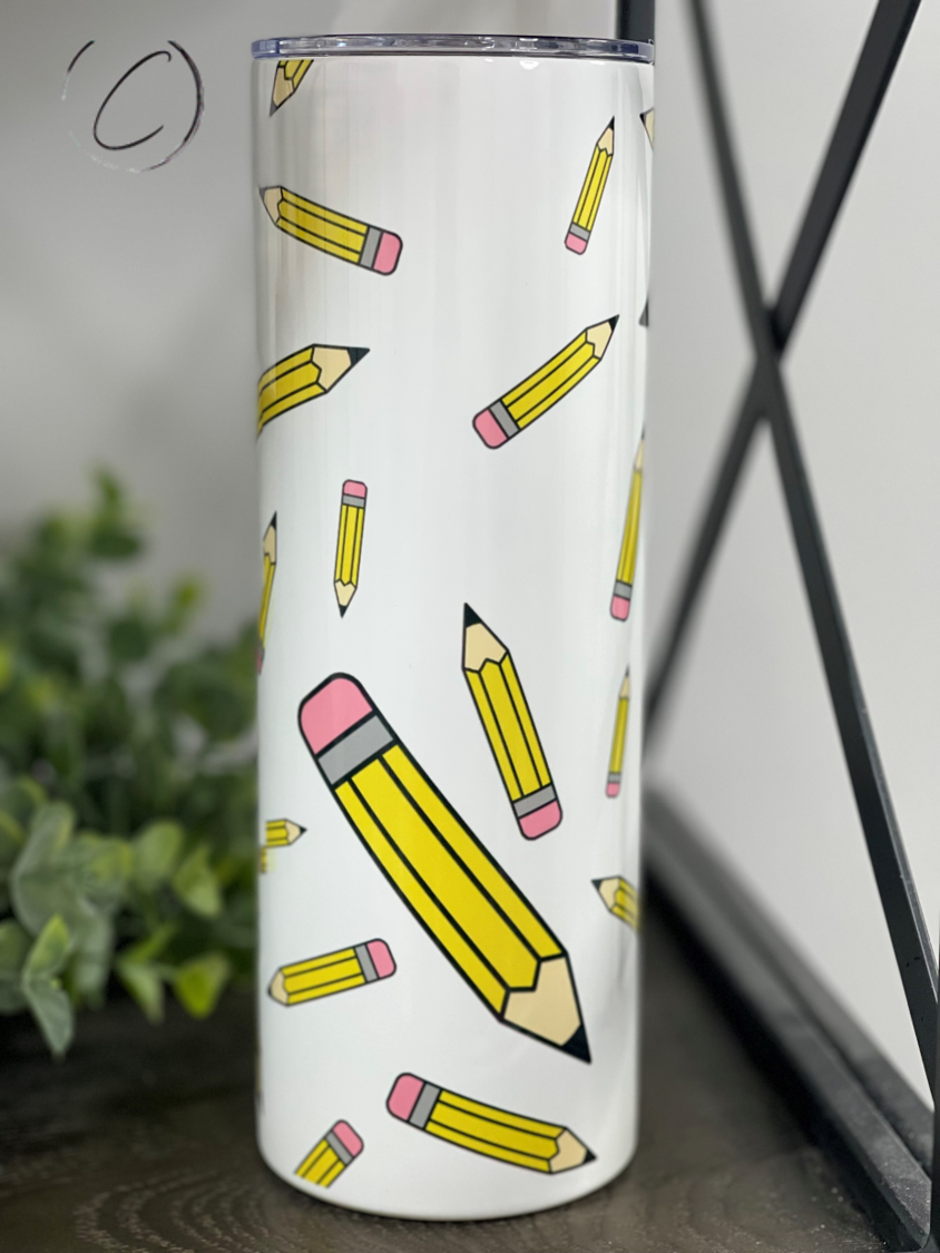 Pencils 20oz Skinny Tumbler with a vibrant full wrap design, featuring a reusable straw and a sleek, insulated body.