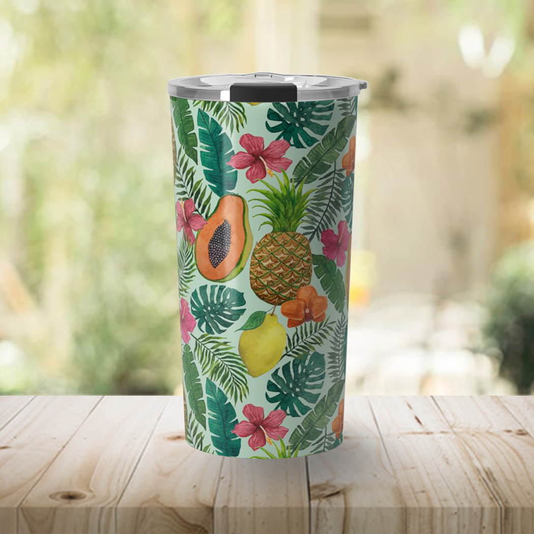 A vibrant Pineapple and Papaya Travel Mug made of stainless steel, featuring a colorful wraparound design and a vacuum-sealed lid.