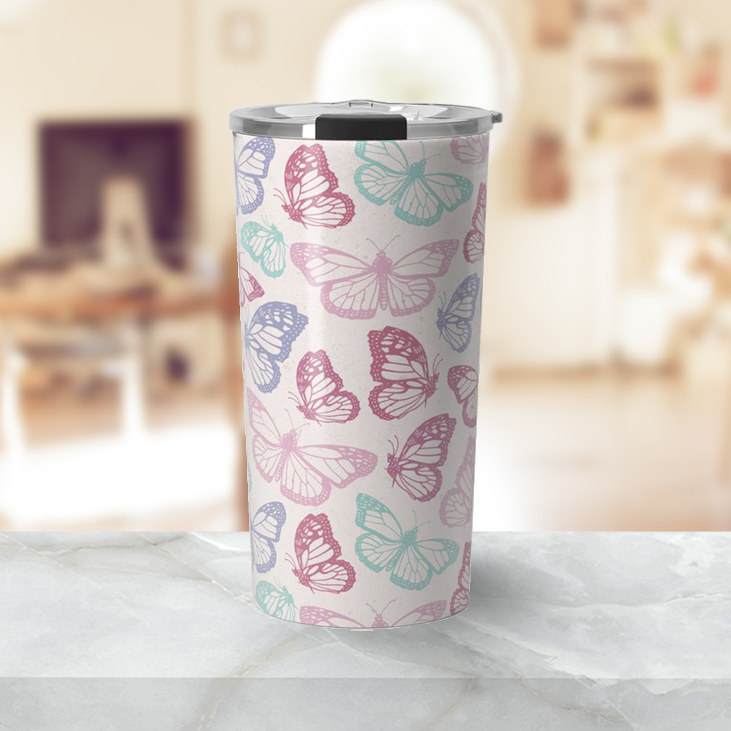 A stylish Pink Butterfly Travel Coffee Mug made of lightweight stainless steel with a vibrant butterfly design, perfect for hot or cold beverages.