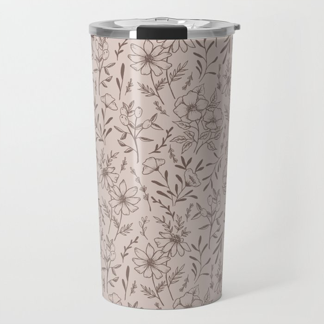 A stylish pink flower travel mug made of stainless steel, featuring a vibrant floral design and a vacuum-sealed lid.