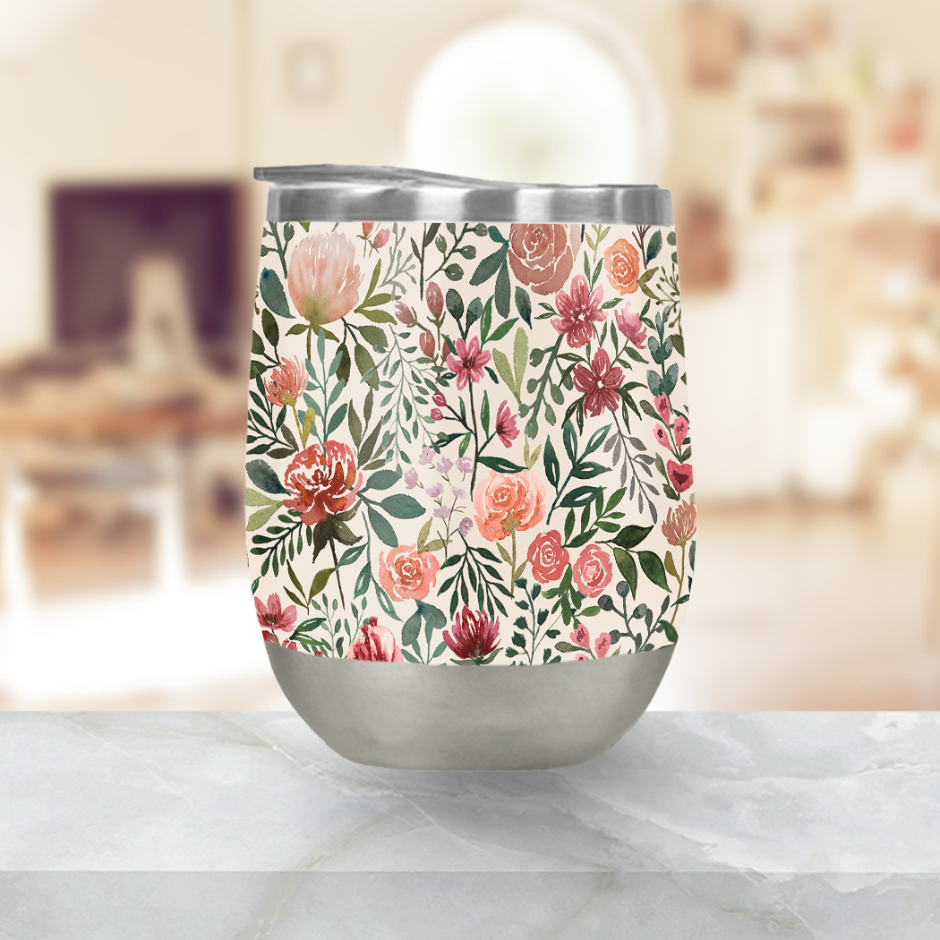 Pink Spring Flowers Stemless Wine Tumbler with floral design, perfect for outdoor use.