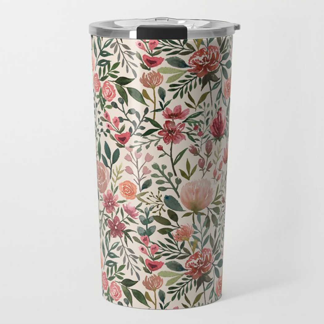 A stylish 20oz travel mug featuring vibrant pink spring flowers design, made of durable stainless steel with a double-walled structure.