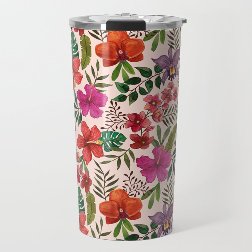 A vibrant pink travel mug featuring a tropical flower design, made of stainless steel with a double-wall for insulation.