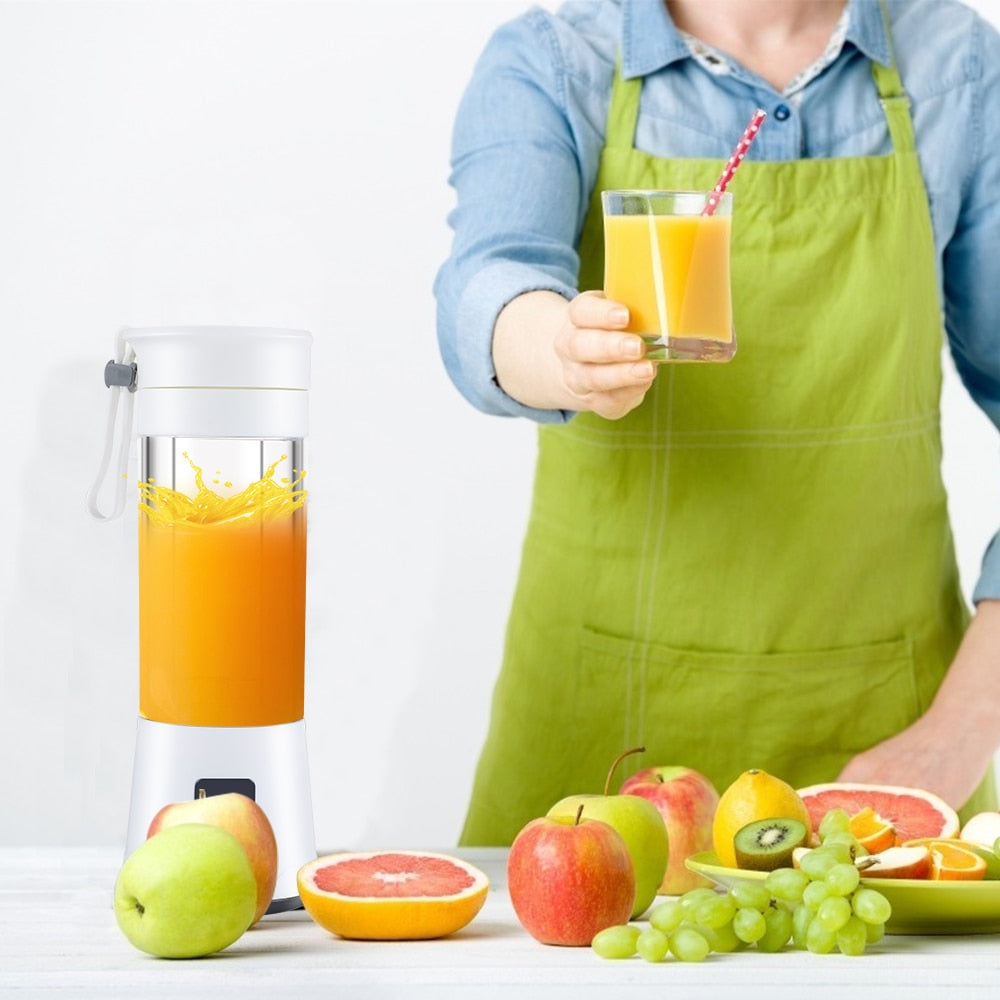 Portable USB Electric Fruit Juicer with stainless steel blades and food-grade ABS material, perfect for making smoothies and juices on the go.