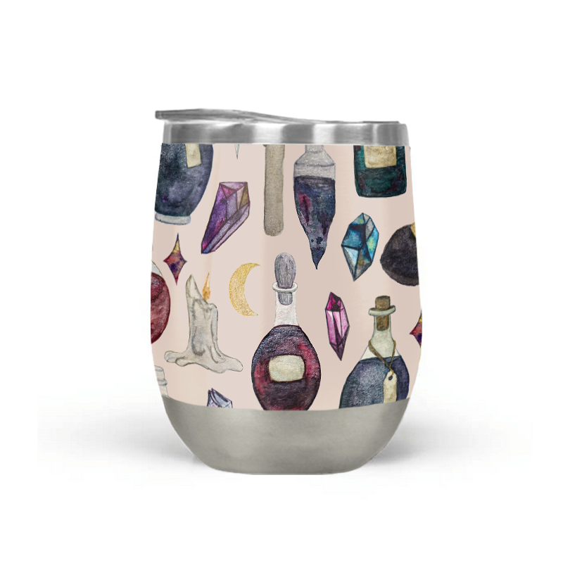 A stylish Potions Pattern Stemless Wine Tumbler made of stainless steel, featuring a whimsical design, perfect for outdoor gatherings.