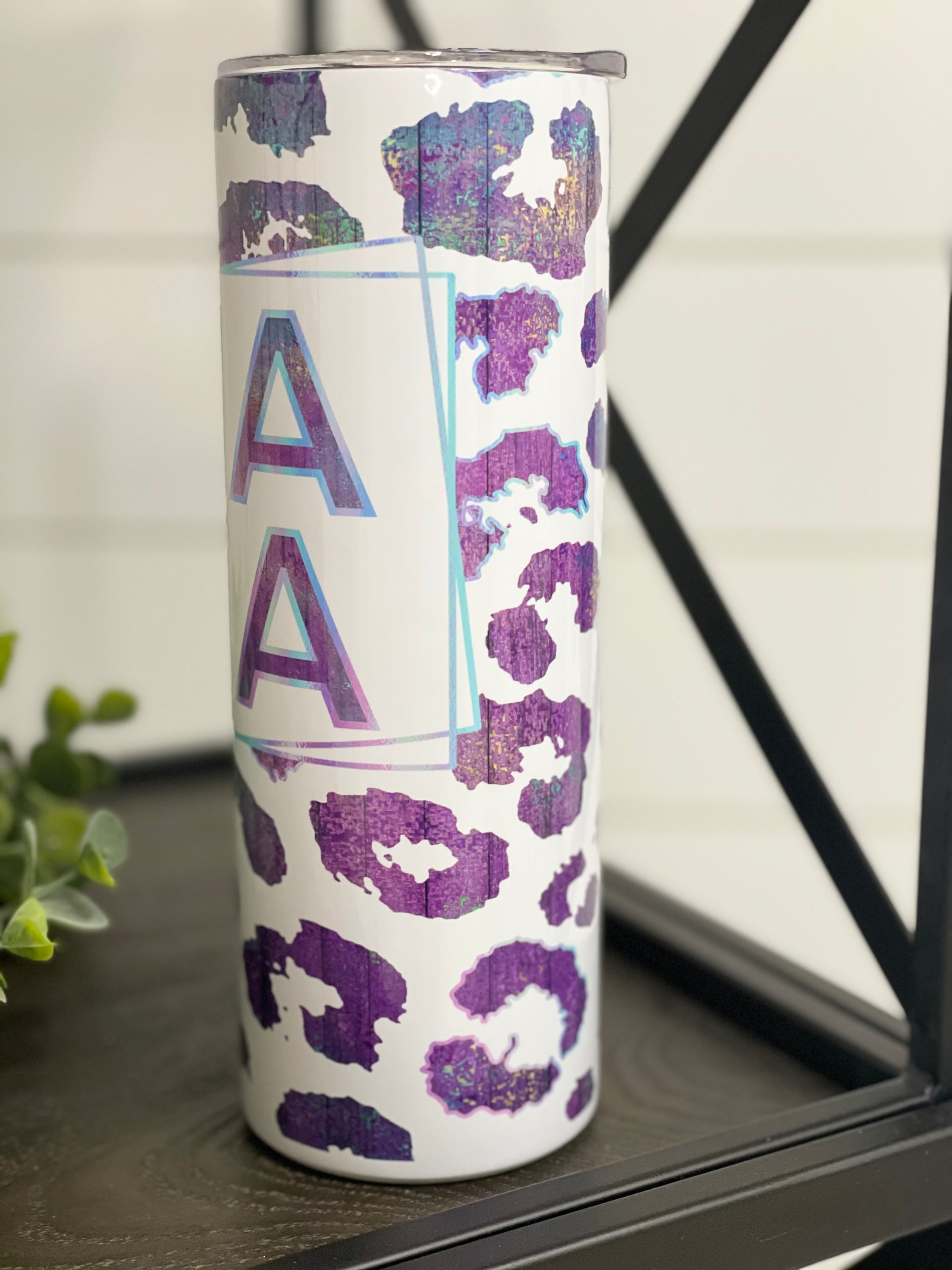 Purple Leopard Mama 20oz Skinny Tumbler with vibrant leopard print design and reusable straw.