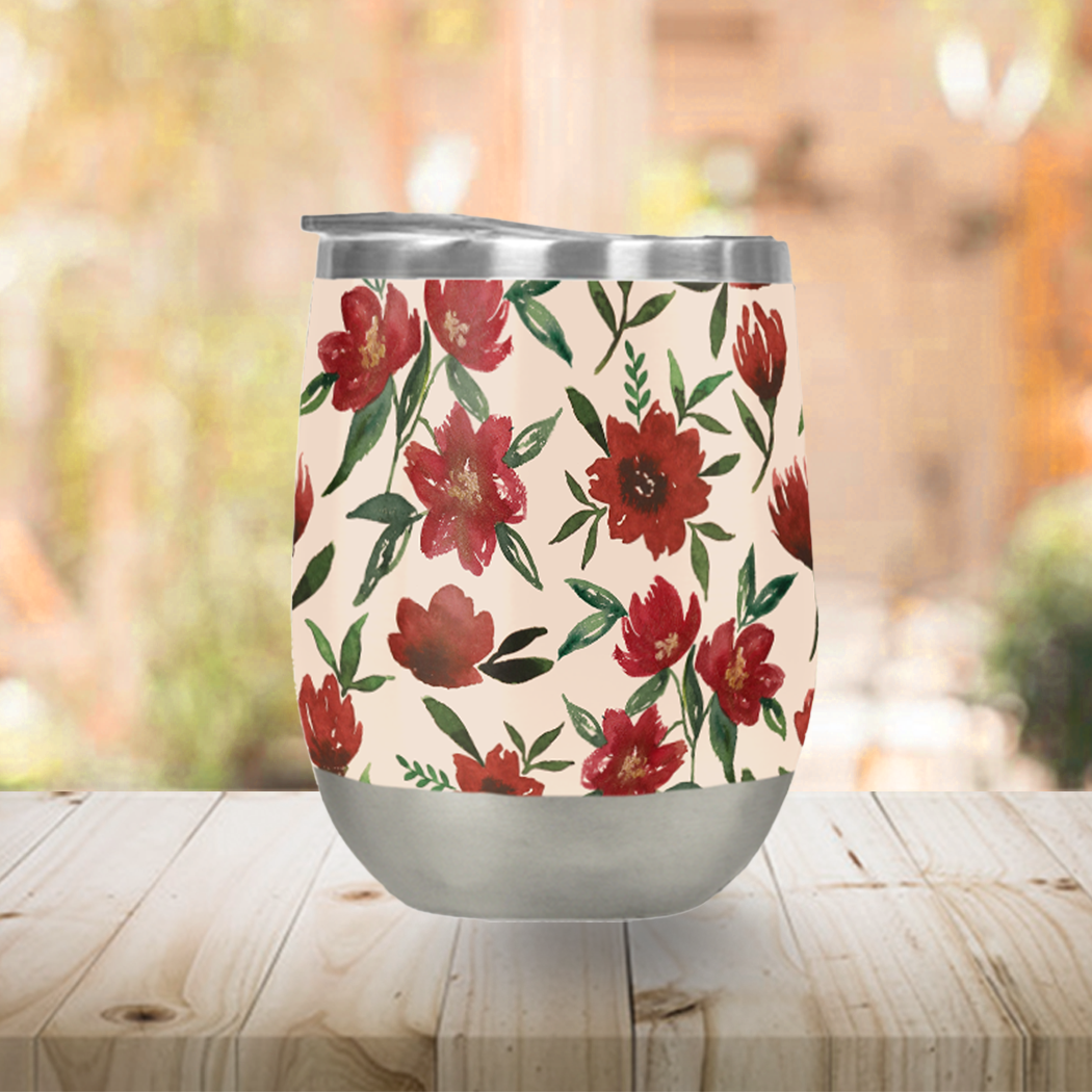 Red Fall Flowers Stemless Wine Tumbler showcasing vibrant floral design and stainless steel construction.