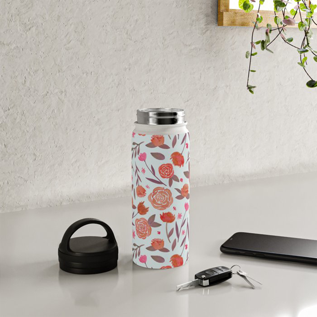 Red Floral Handle Lid Water Bottle with stainless steel body and floral design, perfect for hydration on-the-go.