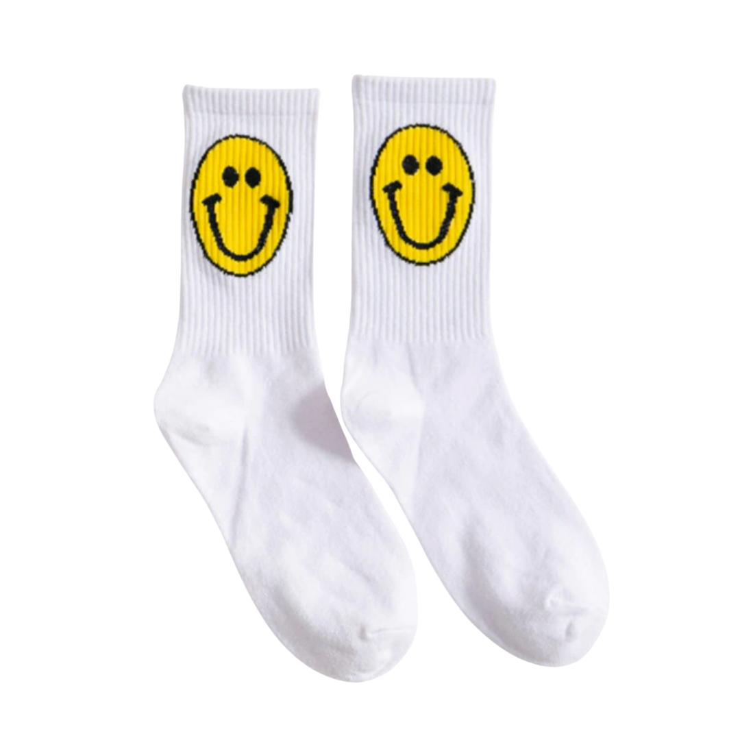 A pair of Retro 1980s Happy Face Cotton Crew Socks featuring a cheerful smiley face design, available in four vibrant colors.