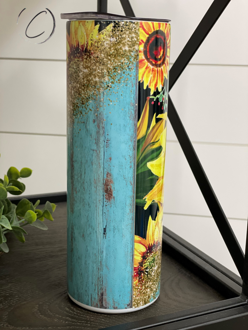 Rustic Sunflower 20oz Skinny Tumbler with a vibrant sunflower design, perfect for hot and cold beverages.