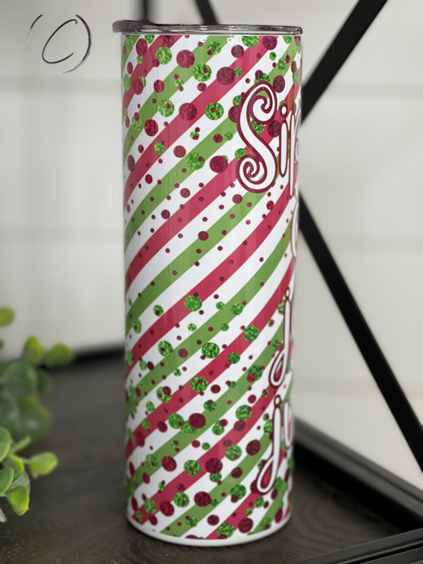 Sippin' On Jolly Juice 20oz Skinny Tumbler with vibrant full wrap design and reusable straw.