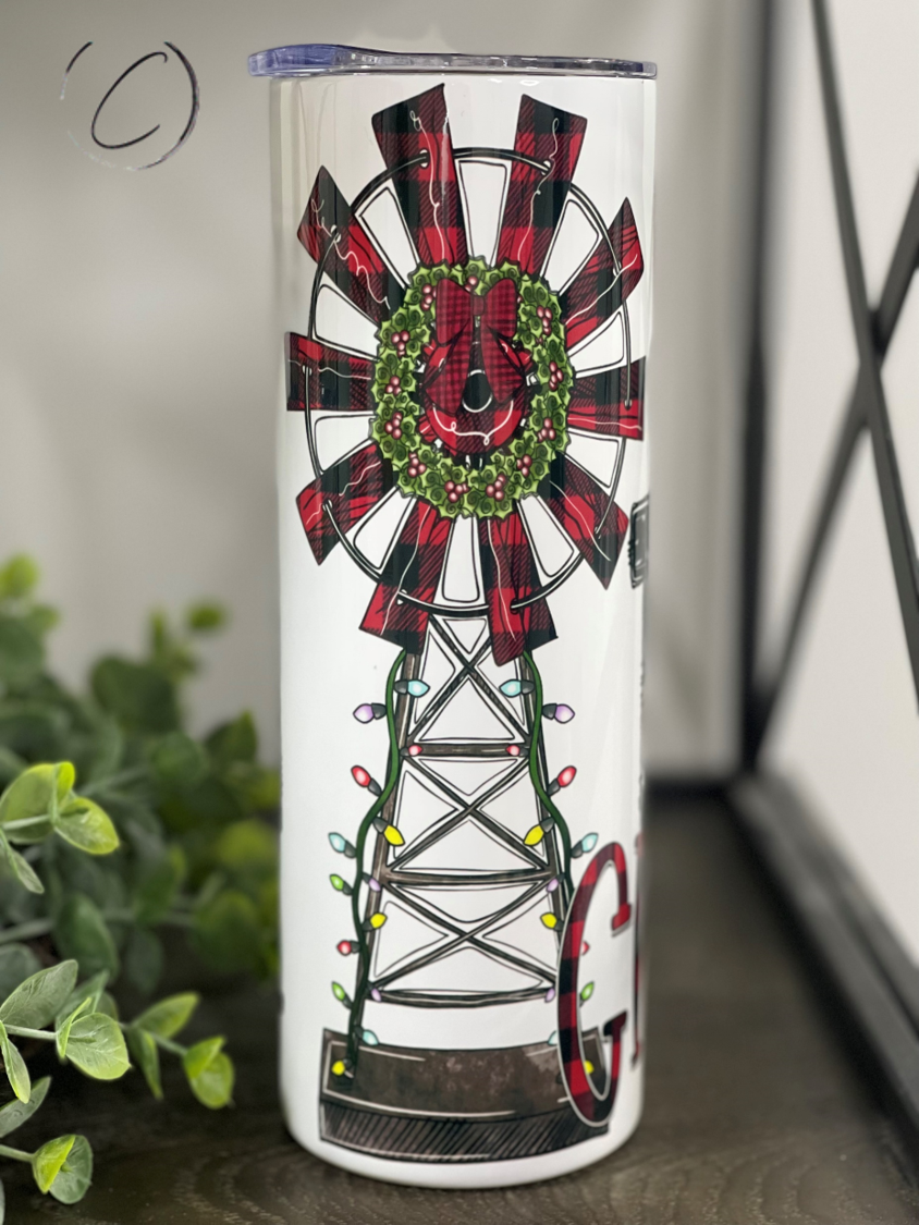 Small Town Christmas 20oz Skinny Tumbler featuring a festive design, perfect for holiday beverages.