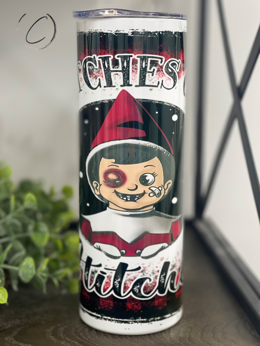 Snitches Get Stitches Elf 20oz Skinny Tumbler with a unique design, perfect for hot and cold beverages.