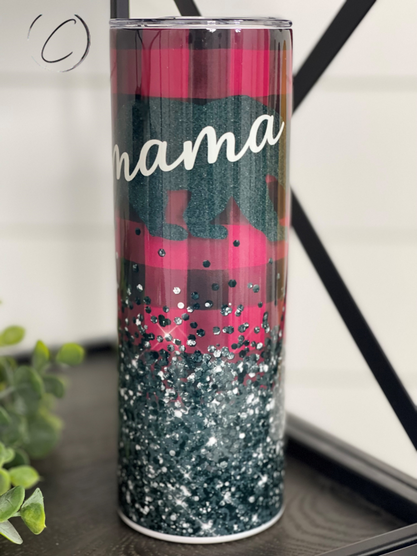 Sparkle & Plaid Mama Bear 20oz Skinny Tumbler with a vibrant design featuring plaid and sparkle elements, perfect for stylish hydration.