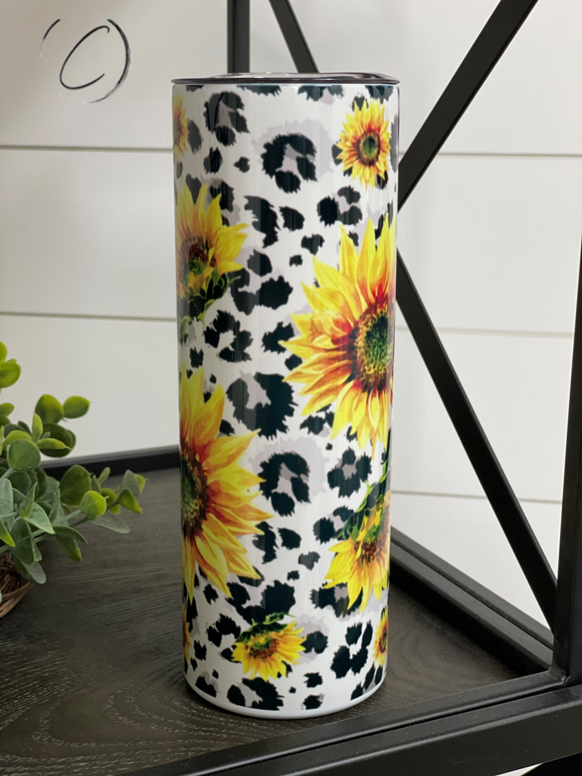 Spotted Sunflower 20oz Skinny Tumbler with vibrant sunflower design, reusable straw included.