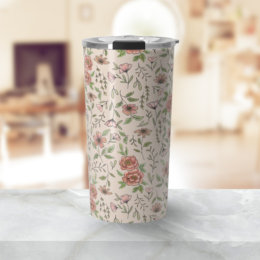 A vibrant Spring Floral Travel Mug made of stainless steel, featuring a beautiful floral design and a vacuum-sealed lid.