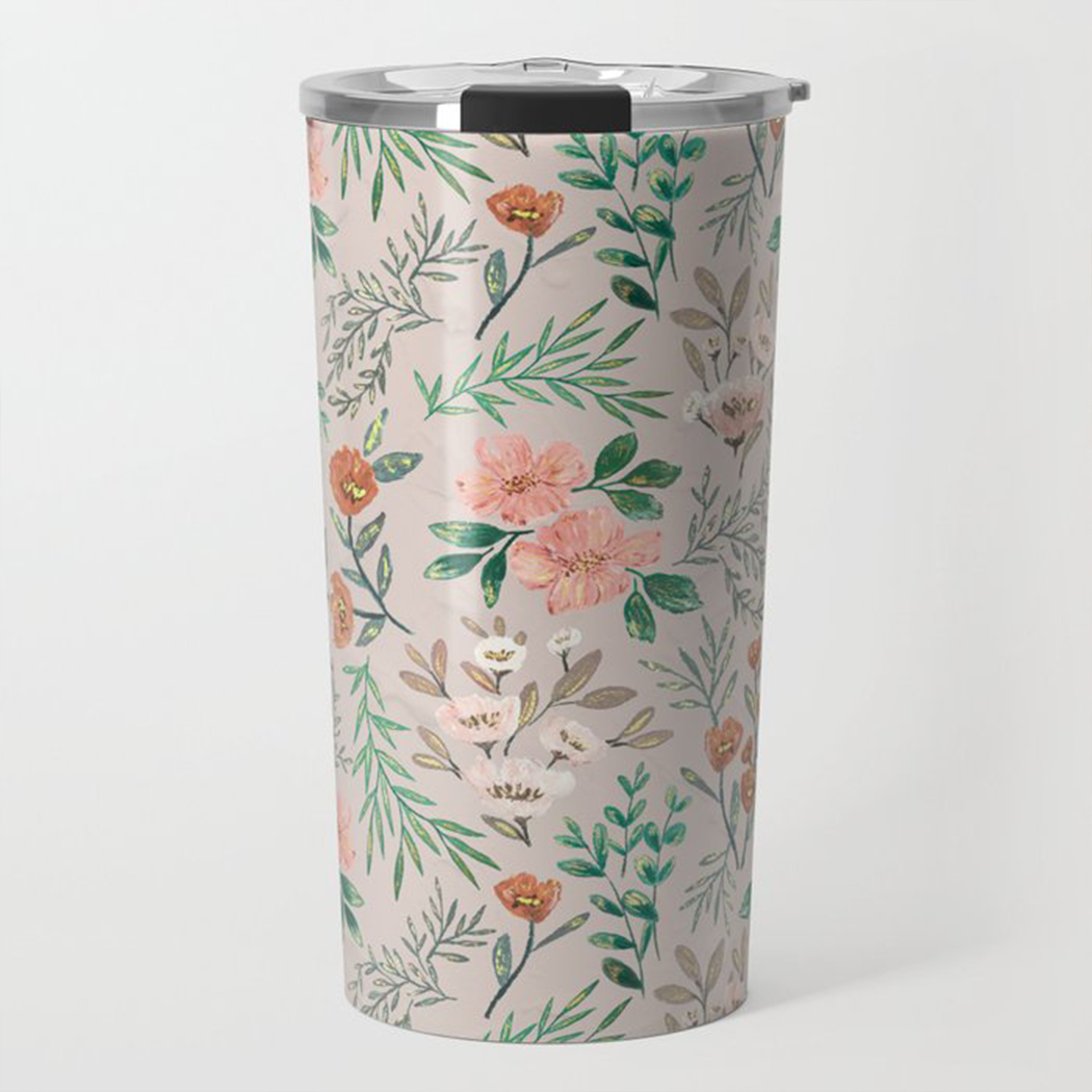 A stylish 20oz Springtime Travel Mug made of lightweight stainless steel with vibrant wraparound artwork, designed for hot and cold beverages.