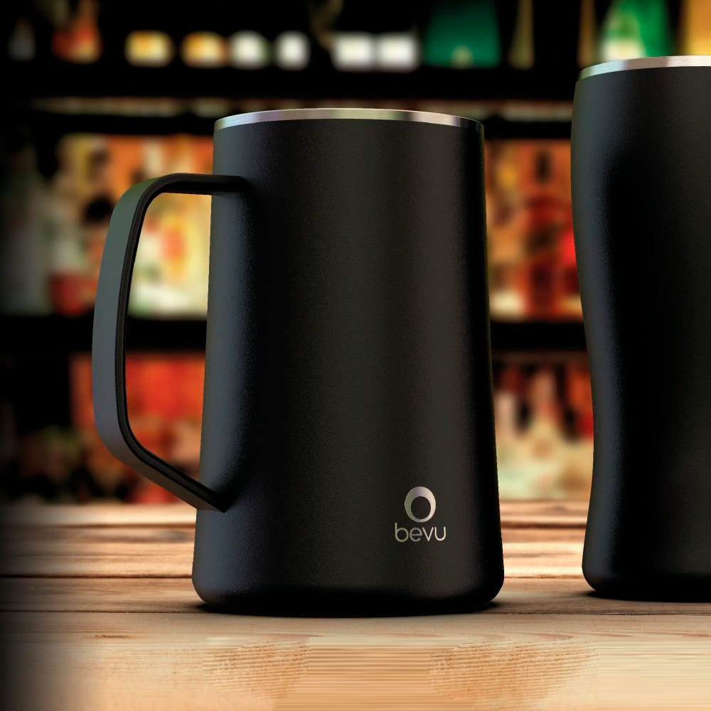 Two 28oz insulated beer steins made of stainless steel, designed to keep beverages cold, featuring a comfortable grip and a sleek finish.