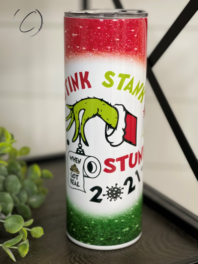 Stink Stank Stunk 2021 20oz Skinny Tumbler with vibrant design and reusable straw.