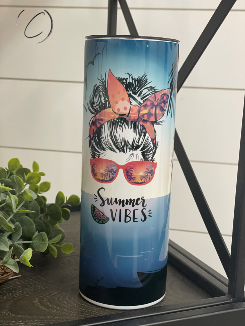 A stylish 20oz skinny tumbler featuring a vibrant summer vibes messy bun design, perfect for drinks on the go.