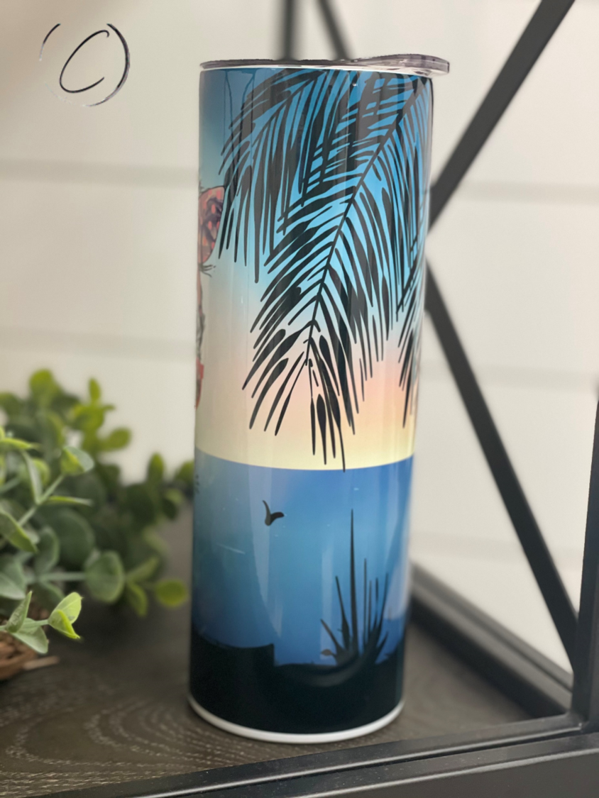 A stylish 20oz skinny tumbler featuring a vibrant summer vibes messy bun design, perfect for drinks on the go.