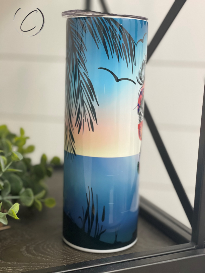 A stylish 20oz skinny tumbler featuring a vibrant summer vibes messy bun design, perfect for drinks on the go.