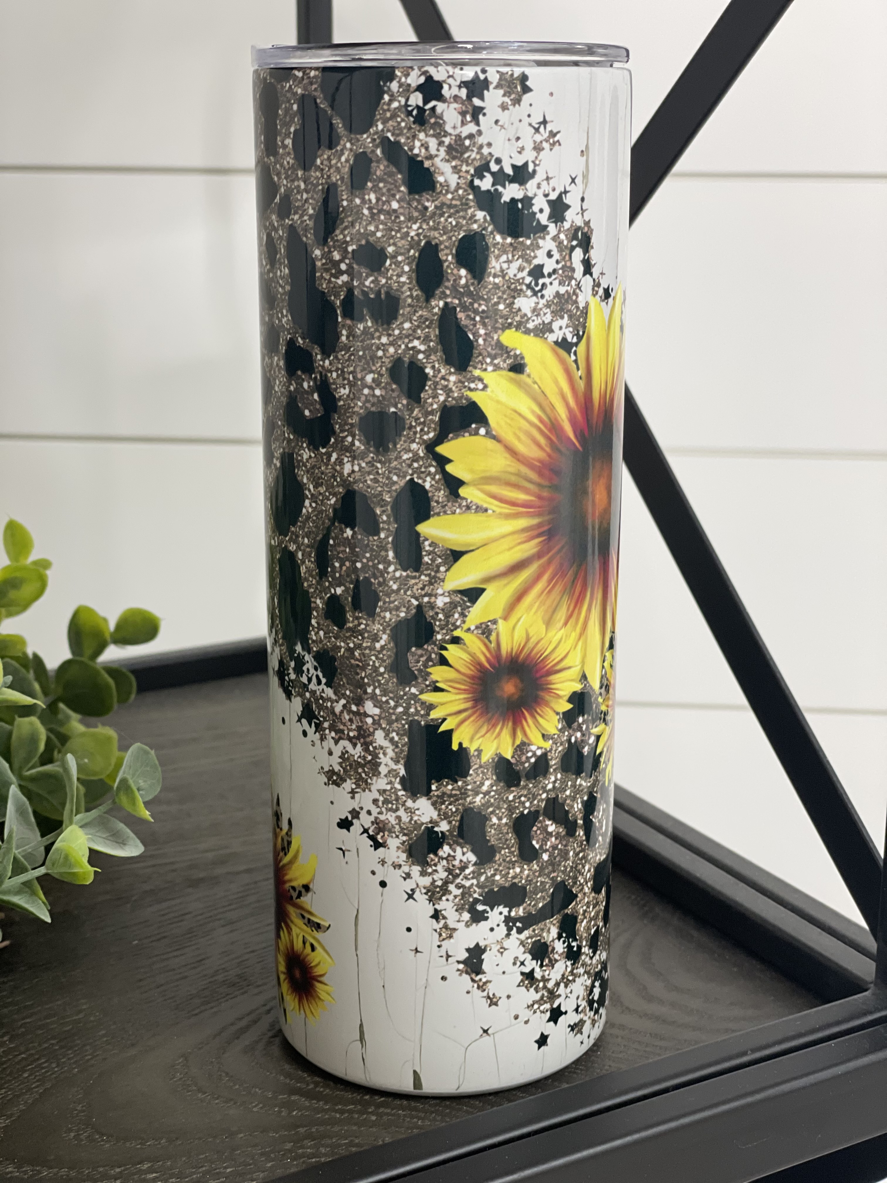 Sunflower Leopard 20oz Skinny Tumbler with vibrant floral and animal print design, featuring a reusable straw.