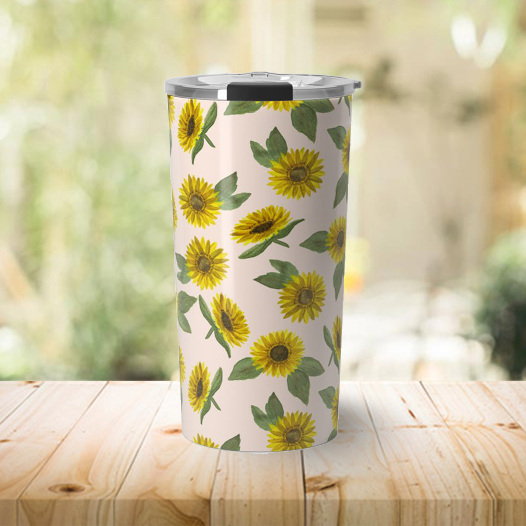 A stylish 20oz stainless steel travel coffee mug featuring vibrant sunflower watercolor artwork, designed for durability and insulation.