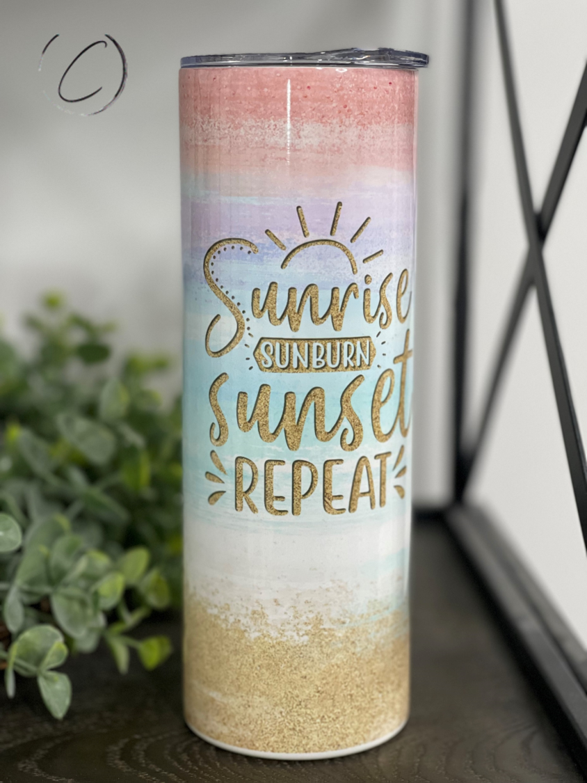 A vibrant Sunrise, Sunburn 20oz Skinny Tumbler featuring a full wrap design, perfect for stylish hydration on the go.