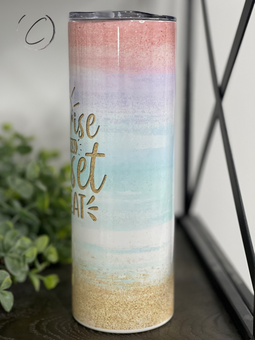 A vibrant Sunrise, Sunburn 20oz Skinny Tumbler featuring a full wrap design, perfect for stylish hydration on the go.