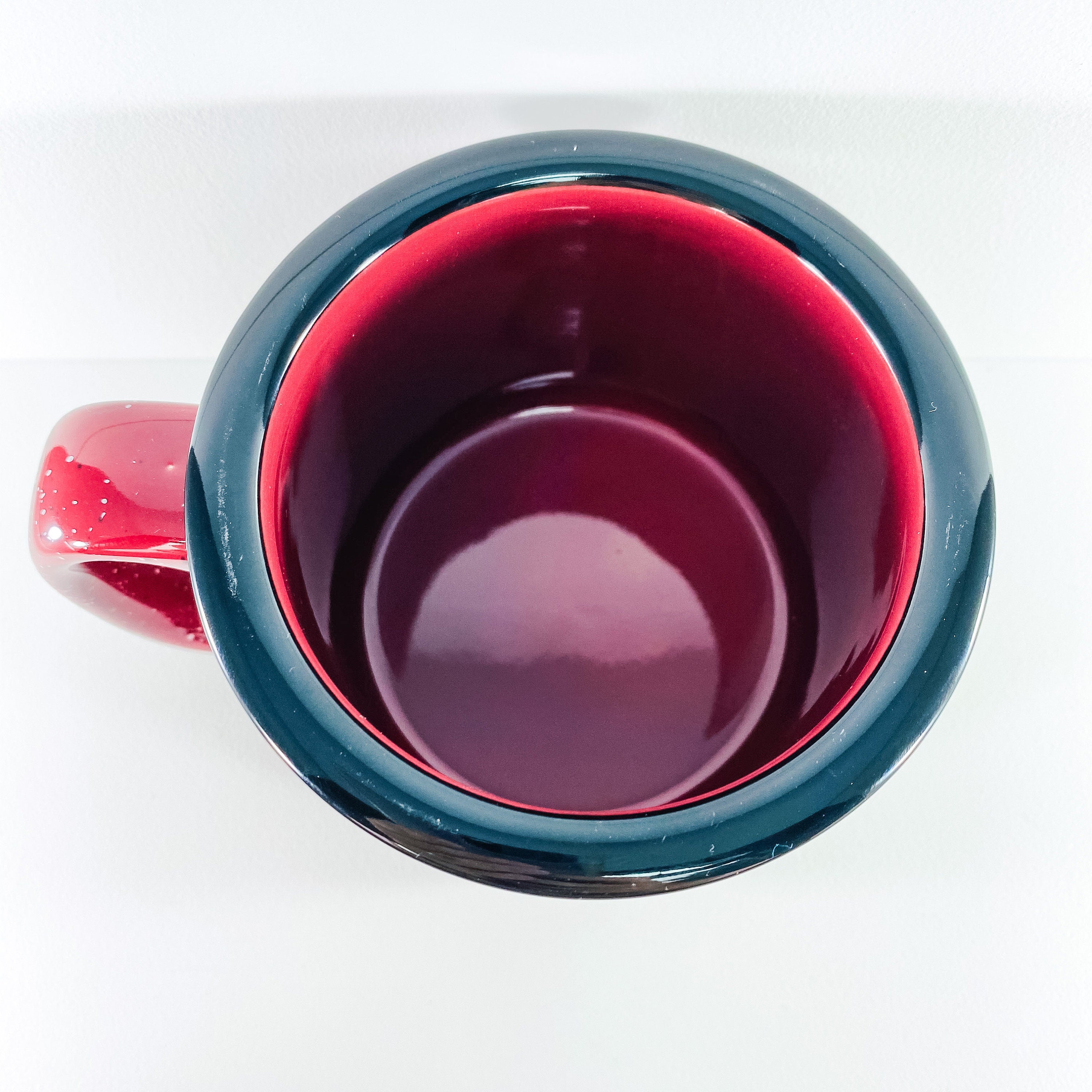 A ceramic coffee mug featuring the phrase 'Thankful Grateful and Blessed' printed on one side, showcasing a stylish design.