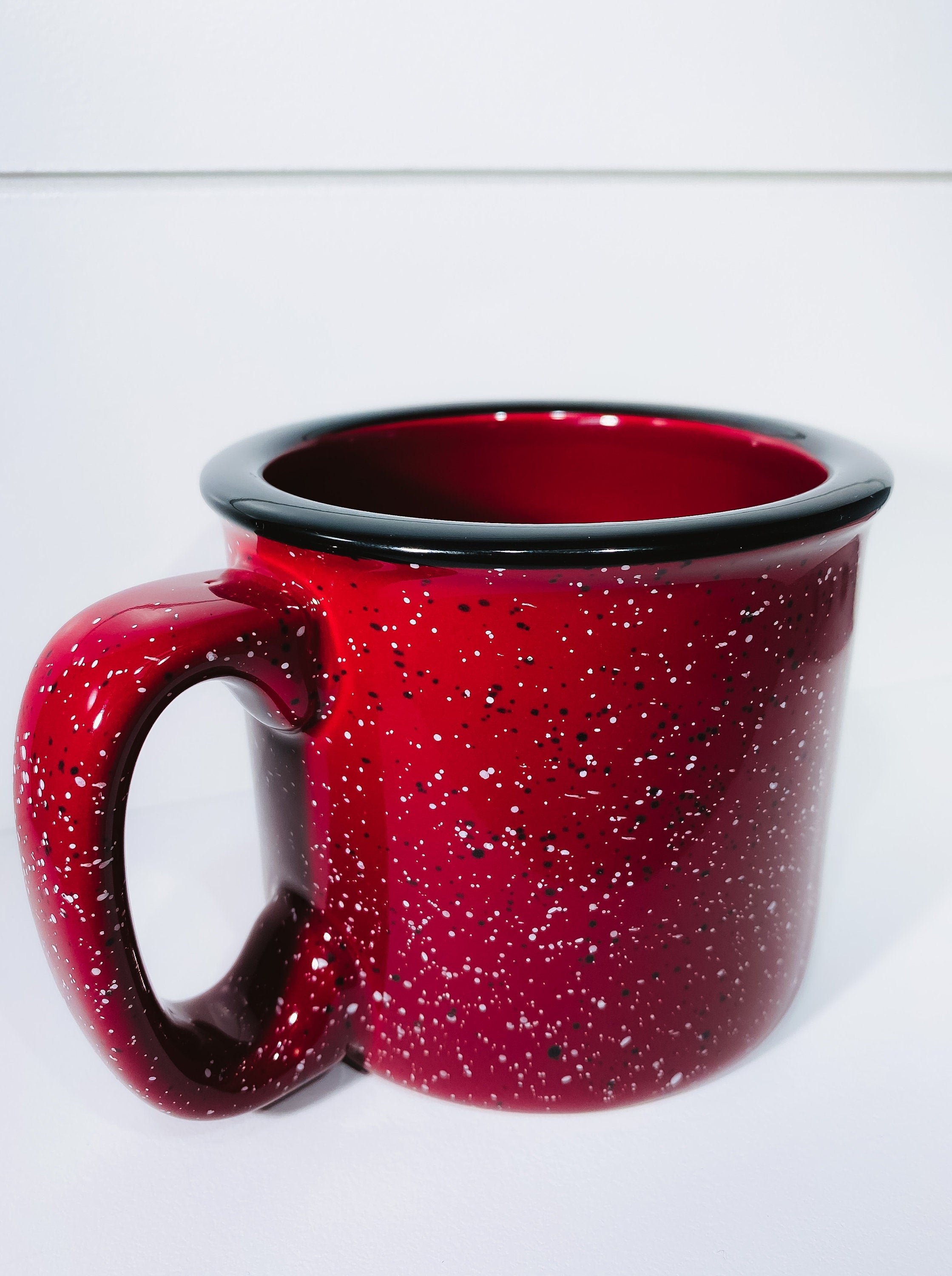 A ceramic coffee mug featuring the phrase 'Thankful Grateful and Blessed' printed on one side, showcasing a stylish design.