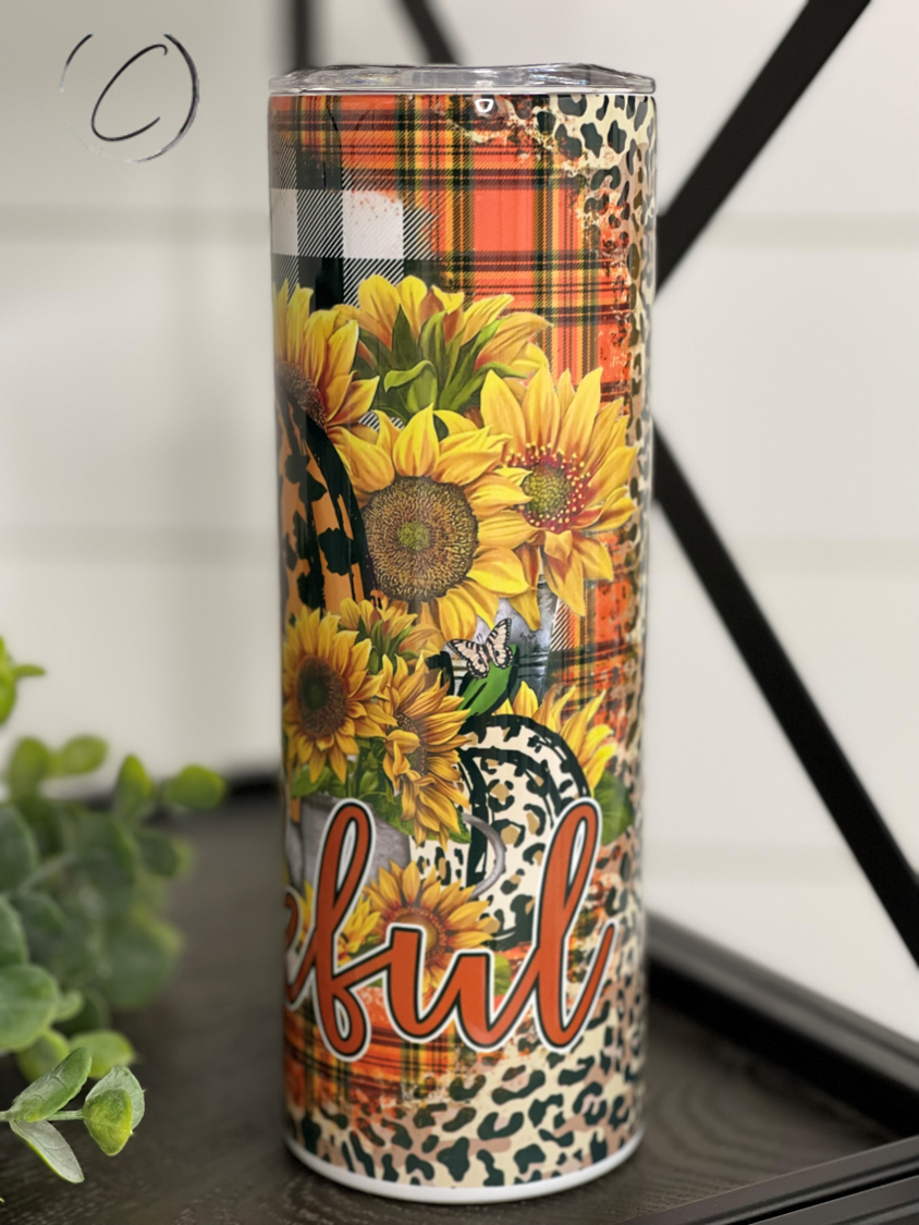 Thankful Pumpkin & Plaid 20oz Skinny Tumbler featuring a vibrant pumpkin and plaid design, perfect for fall beverages.