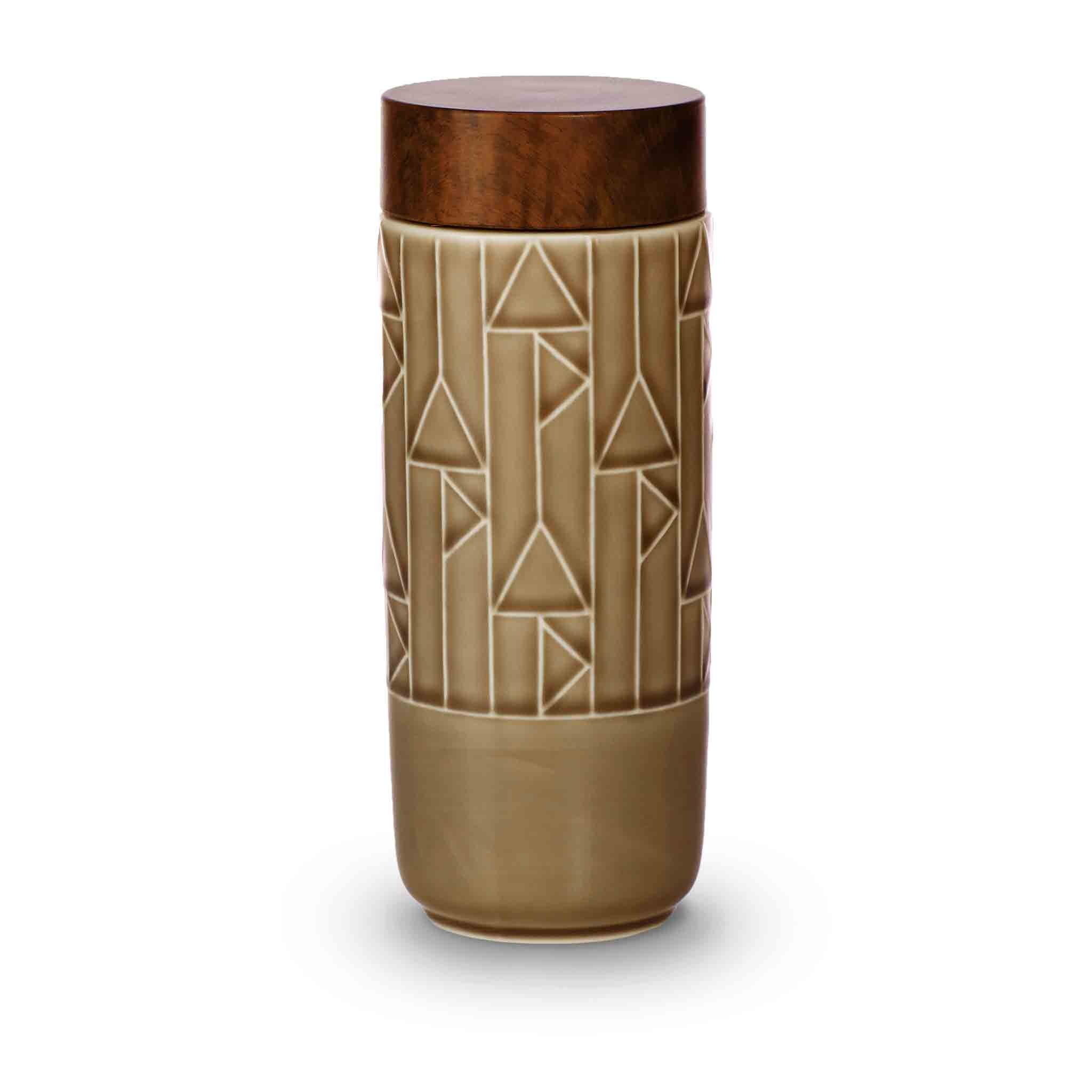 The Alchemical Signs Tumbler featuring vibrant geometric patterns inspired by ancient alchemical symbols, crafted from ceramics with a stylish lid.