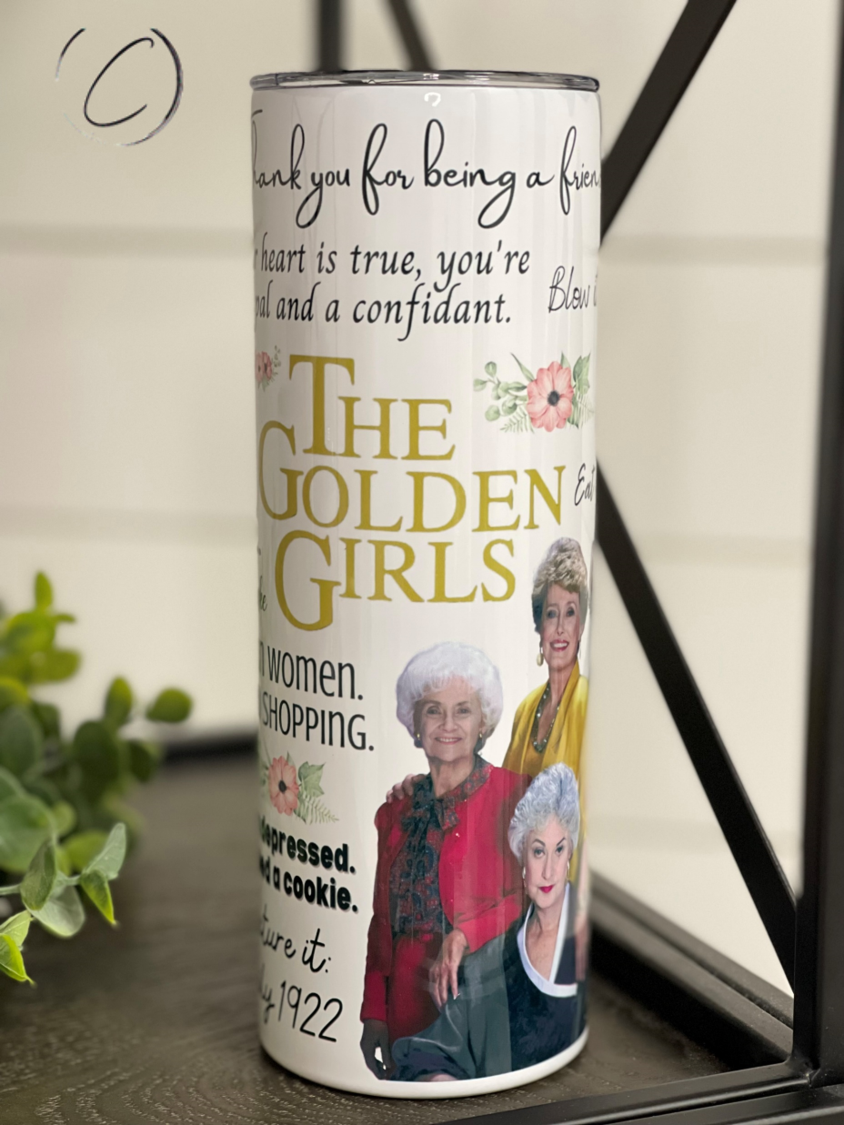 The Golden Girls 20oz Skinny Tumbler featuring vibrant design and reusable straw, perfect for fans.