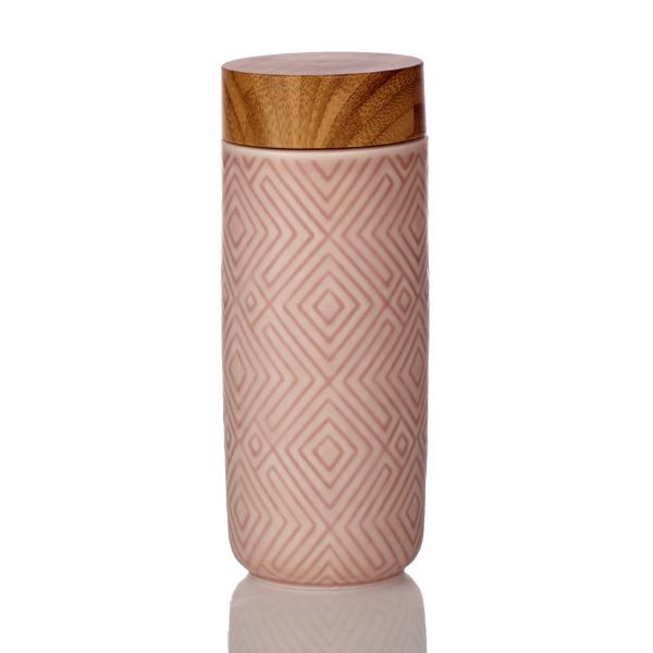 The Miracle Ceramic Tumbler showcasing its elegant design with a bamboo effect lid, featuring a tourmaline lining for enhanced beverage purity.