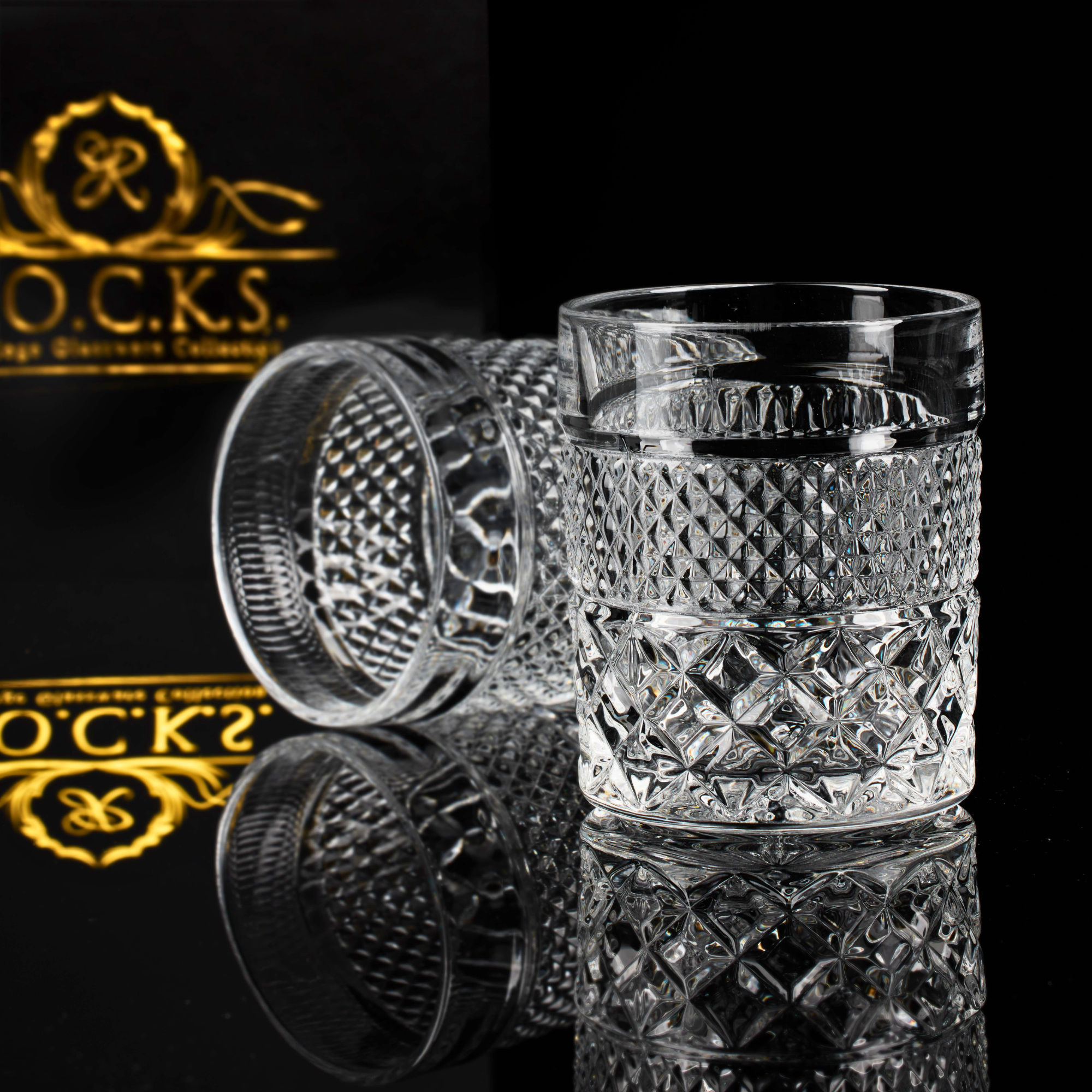 A set of four elegant crystal whiskey glasses from The Privilege Collection - Admiral Glasses, showcasing their timeless design and premium quality.