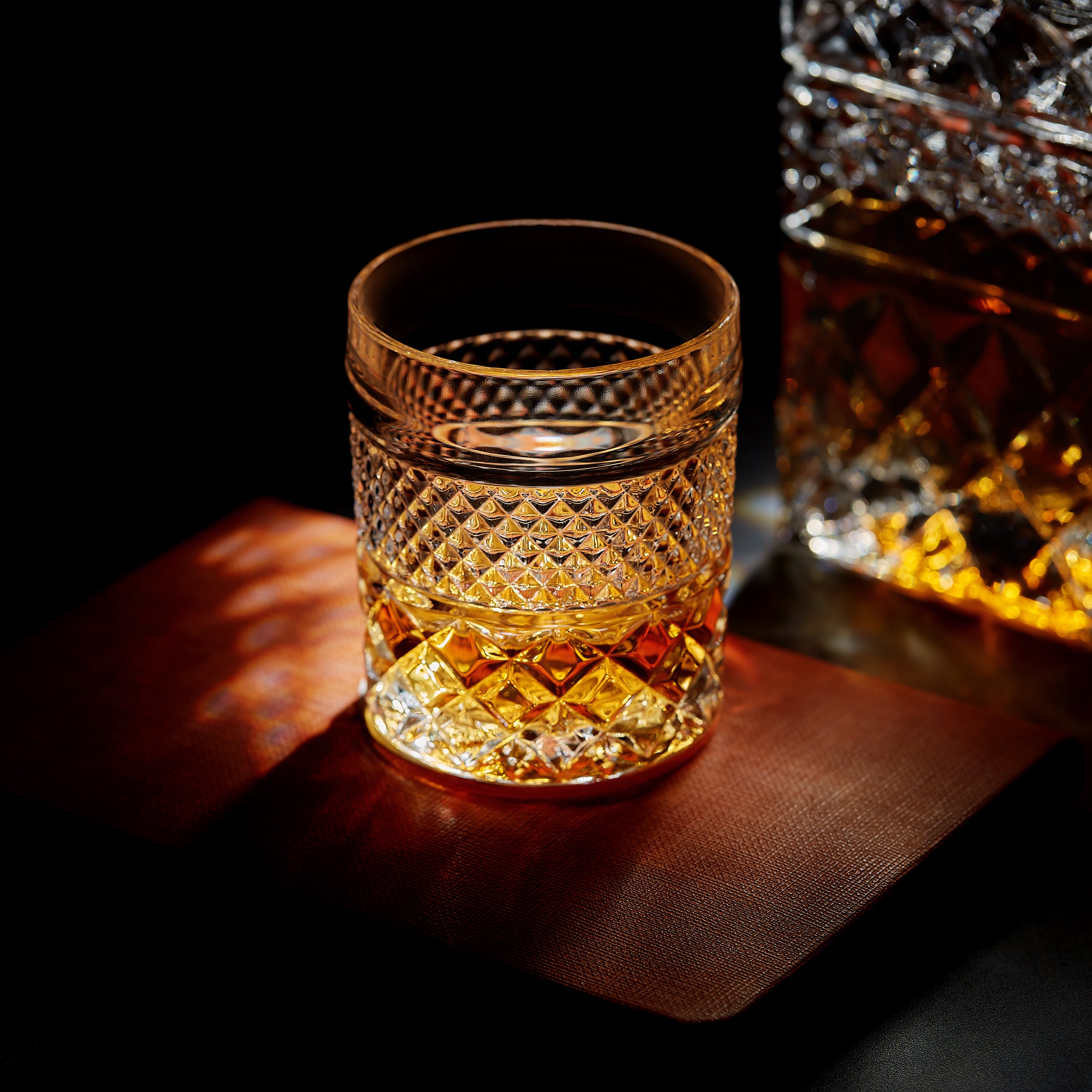 A set of four elegant crystal whiskey glasses from The Privilege Collection - Admiral Glasses, showcasing their timeless design and premium quality.