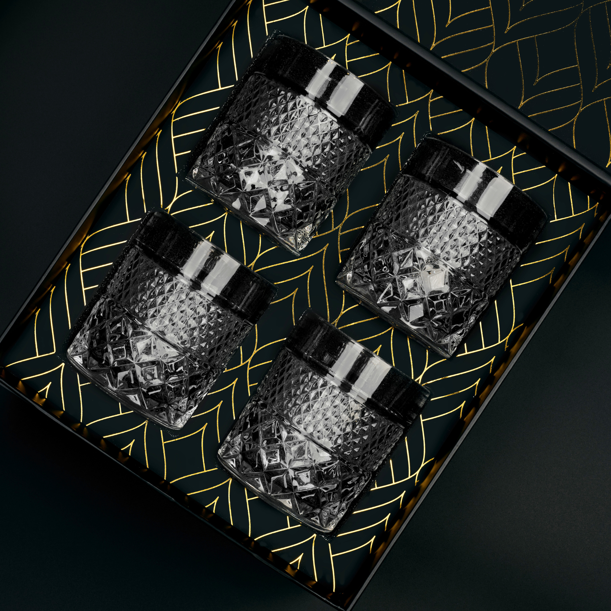 A set of four elegant crystal whiskey glasses from The Privilege Collection - Admiral Glasses, showcasing their timeless design and premium quality.