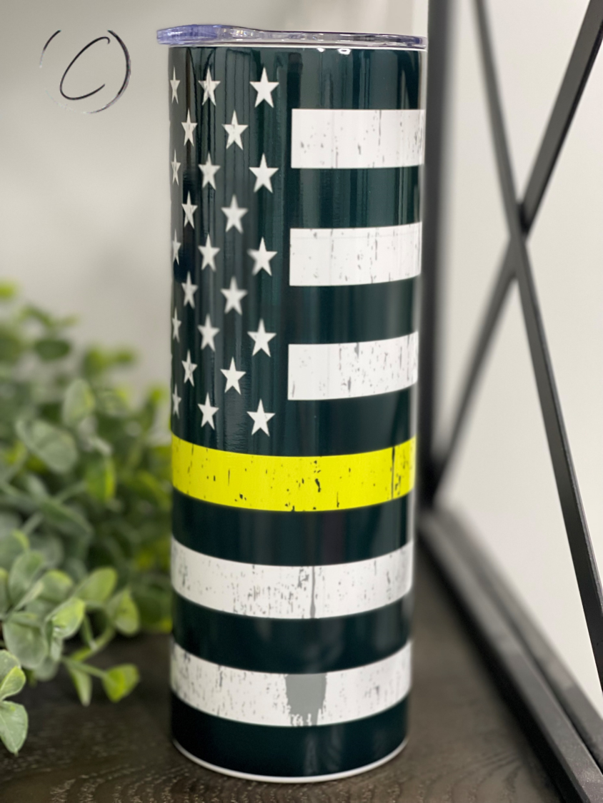 THIN YELLOW LINE 20OZ TUMBLER featuring a full wrap design, durable material, and a reusable straw.