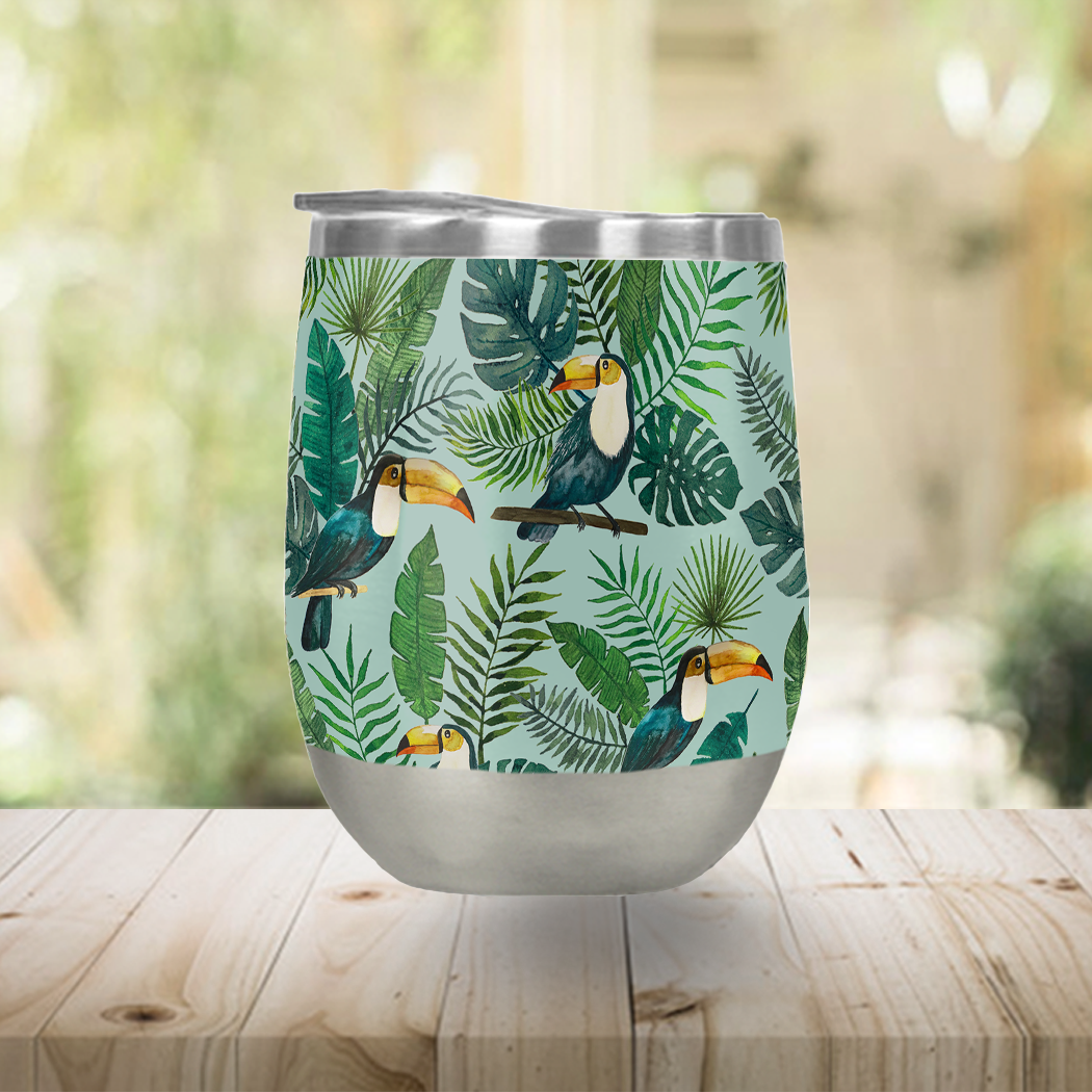 Tropical Toucan Wine Tumbler featuring vibrant toucan design and stainless steel construction, perfect for outdoor use.